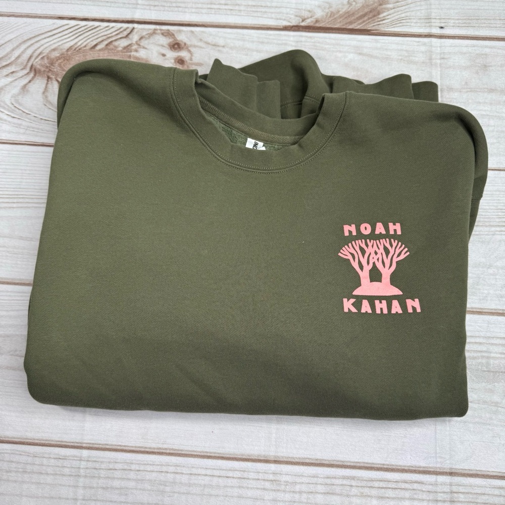 Noah Kahan 2024 concert merch with pink graphics